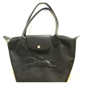 Limited edition black Longchamp tote with  logo.